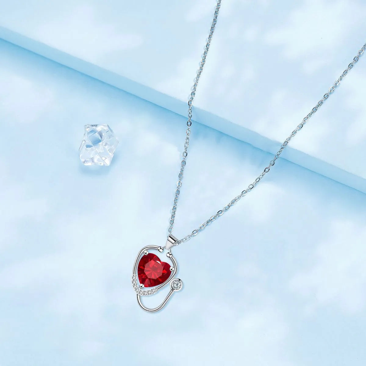 Red diamond women's stethoscope necklace with fashion wings cross design on copper with electroplated finish