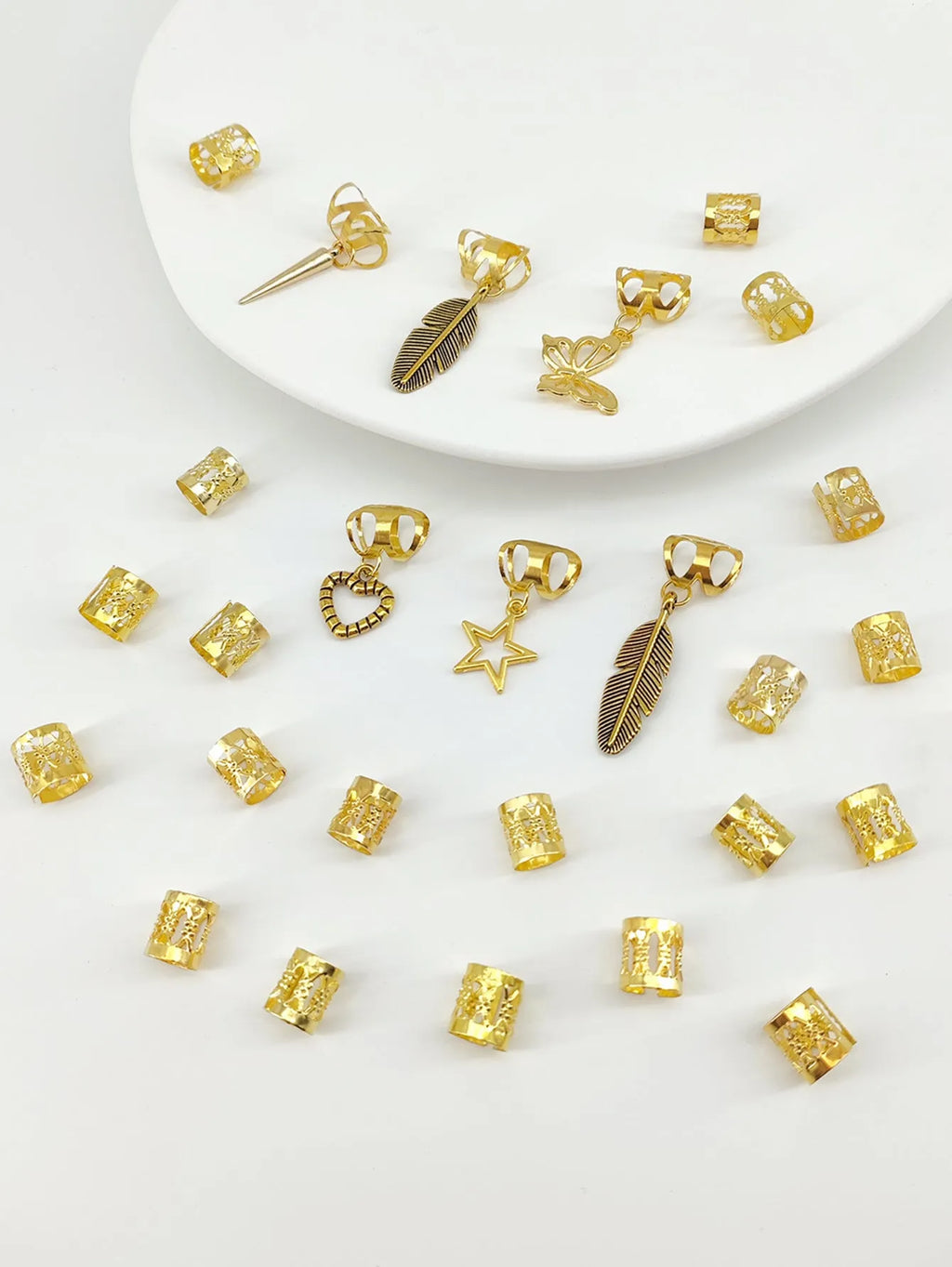 Pack of 26 antique-style hair rings with leaves and braid design in gold or silver electroplated finish