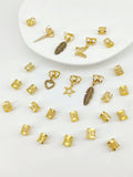 Pack of 26 antique-style hair rings with leaves and braid design in gold or silver electroplated finish
