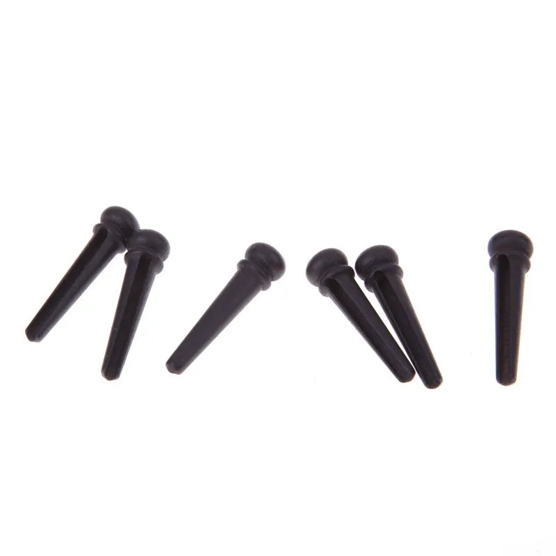 Six solid ebony guitar string pins with matt black finish for folk acoustic guitars