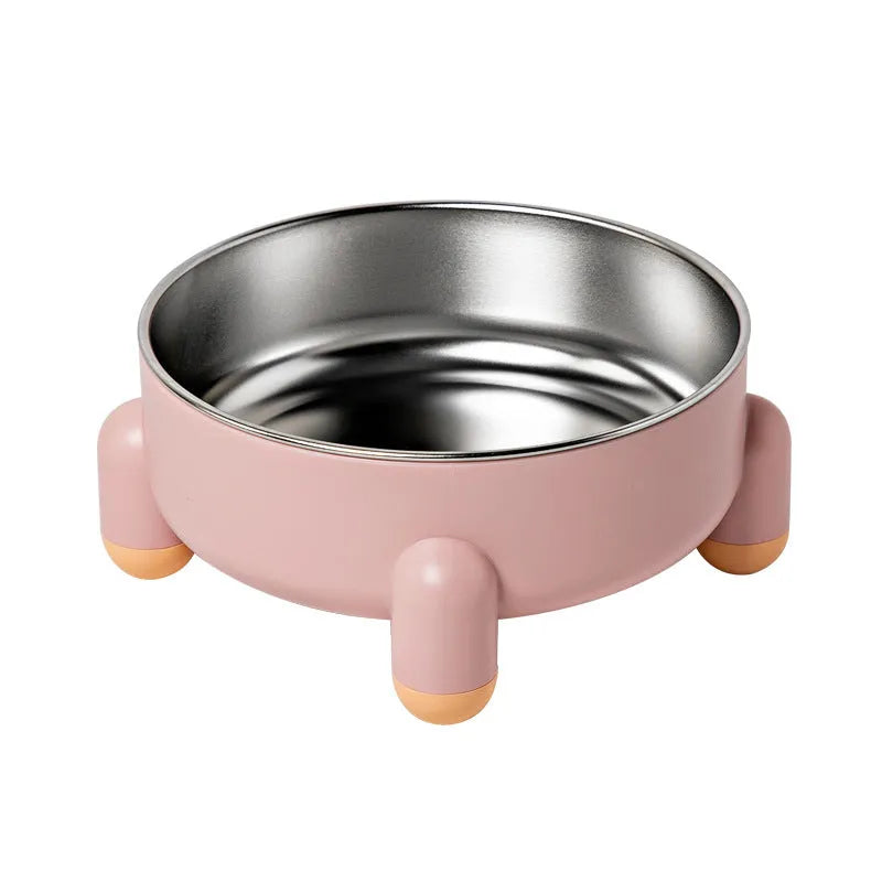 Green stainless steel pet bowl with a high foot and non-slip silicone base on a floor