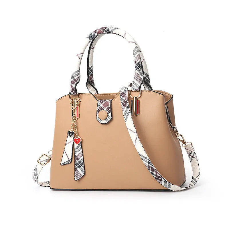 Large-capacity ladies PU Boston handbag with zipper and metal trim, medium size, available in multiple colours