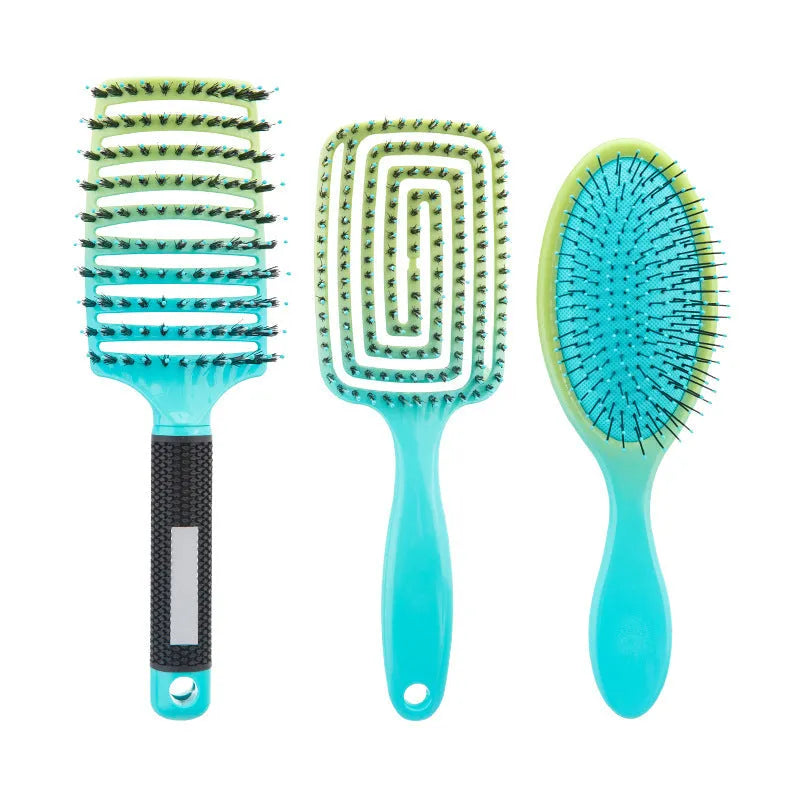 Gradient curly hair hollow comb set with three combs in orange and yellow gradient on a light background