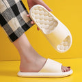 Summer slippers with grape particle massage sole in pink colour, EVA material, unisex design for indoor use
