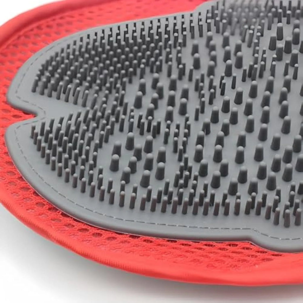 Red pet bathing glove with integrated brush surface for grooming and hair removal during pet washing
