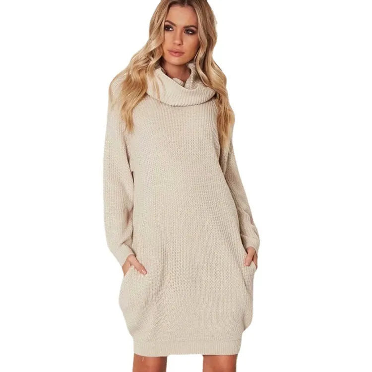 Loose fit mid-length pullover sweater with pockets in imitation cashmere fabric.