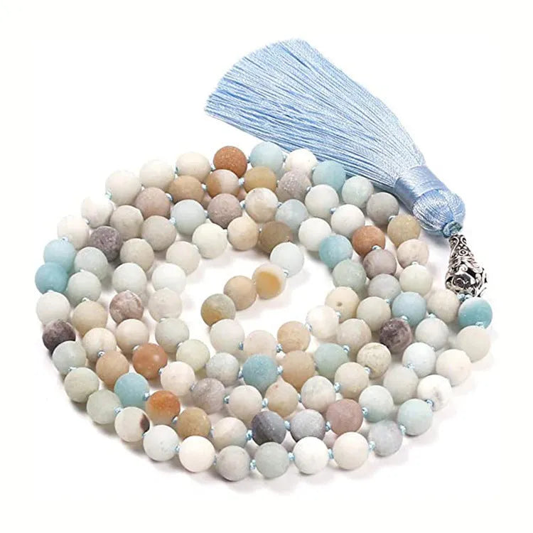 Agate tassel necklace with geometric pattern featuring multiple colourful stones including amethyst and lapis lazuli