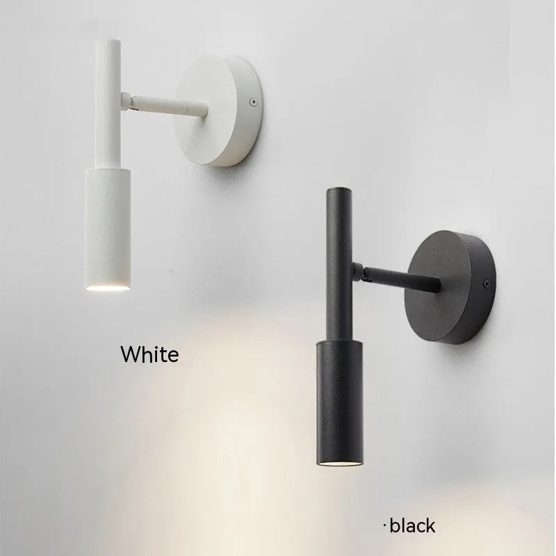 Modern minimalist wrought iron wall lamp in black or white with adjustable three-colour lighting.