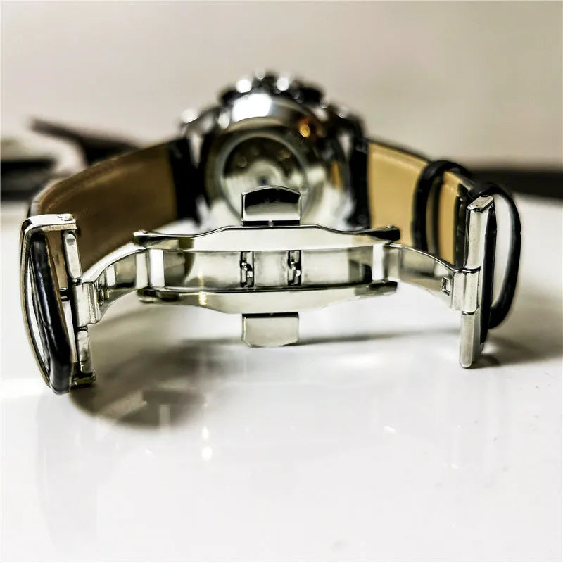Men's automatic mechanical watch showing 12mm thickness and multiple colour options including silver, black steel, and black with gold