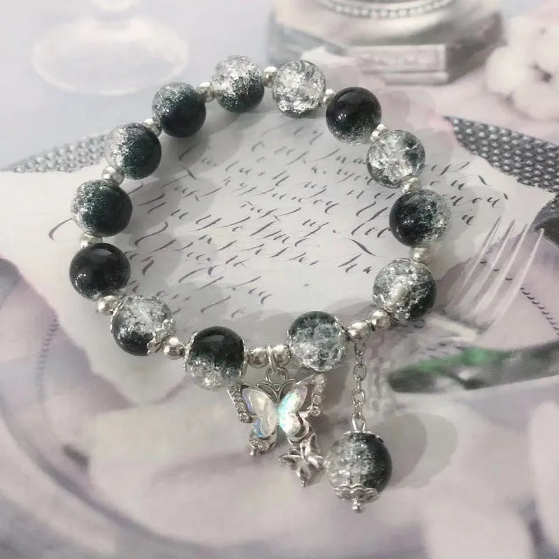 Chinese style glass bracelet with bamboo joint details in a red Lvzhu Duobao design.