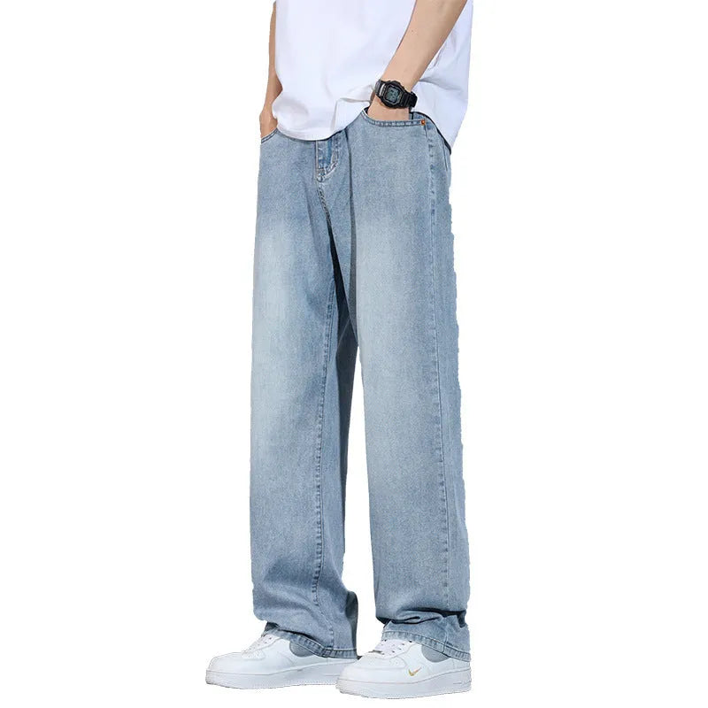 Straight-leg denim casual trousers in thin fabric on a hanger.