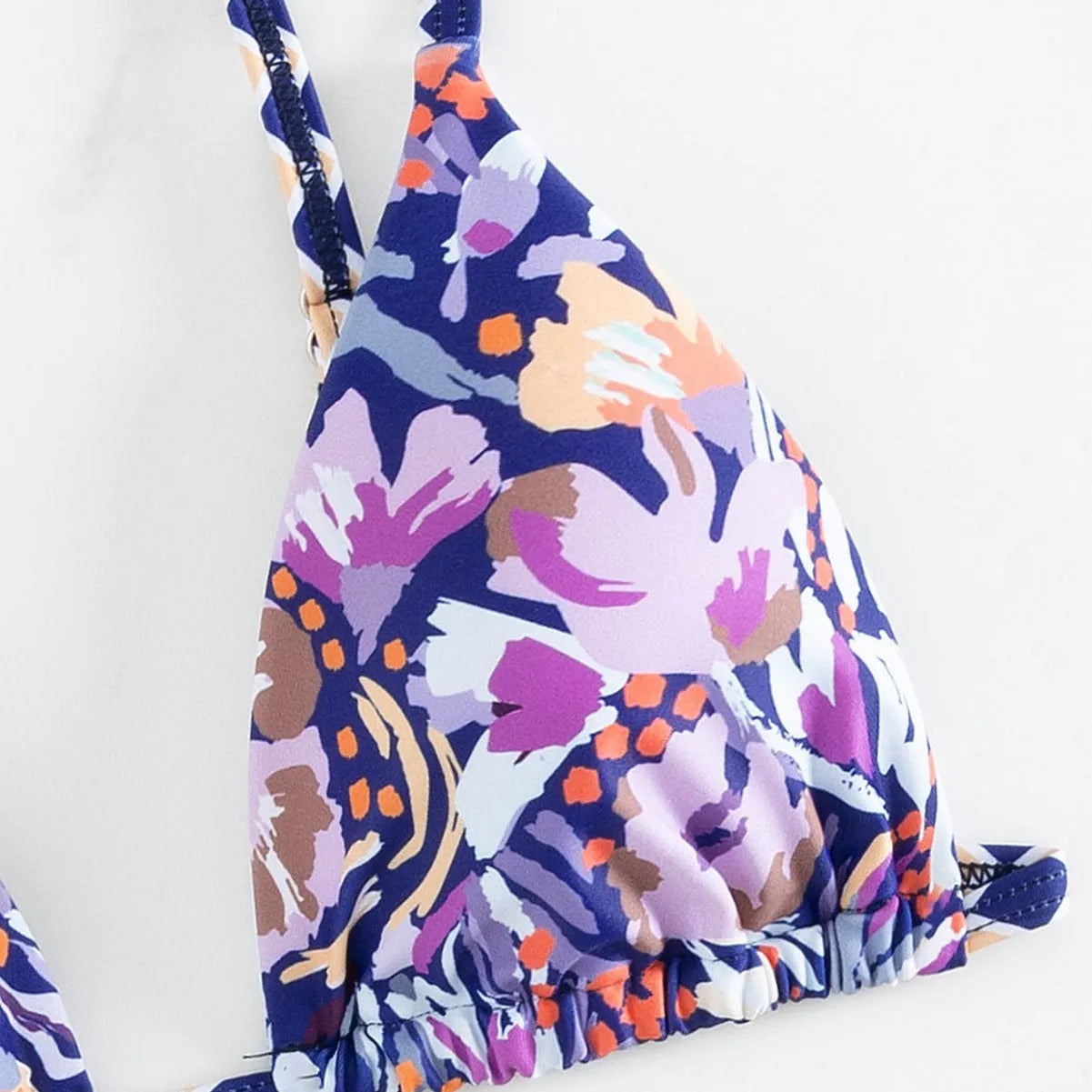 Women's floral print triangle bag swimsuit in polyester fabric with briefs cut