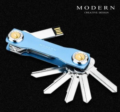 Multi-function metal keychain with stainless steel and anodised aluminium finish, featuring split ring and carabiner, in grey colour option.