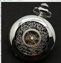 Retro hollow floral print mechanical pocket watch with transparent case back in gold colour.