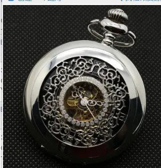 Retro hollow floral print mechanical pocket watch with transparent case back in gold colour.