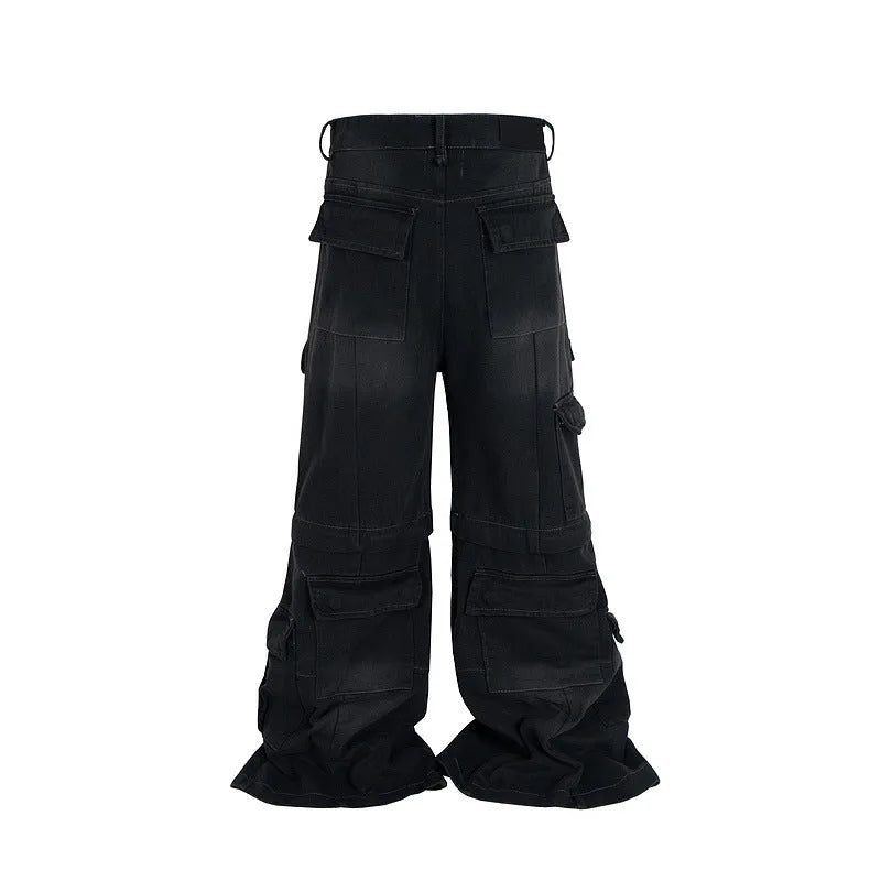Detachable washed-out cotton overalls with multiple pockets in black colour showing mid-waist fit and zip placket