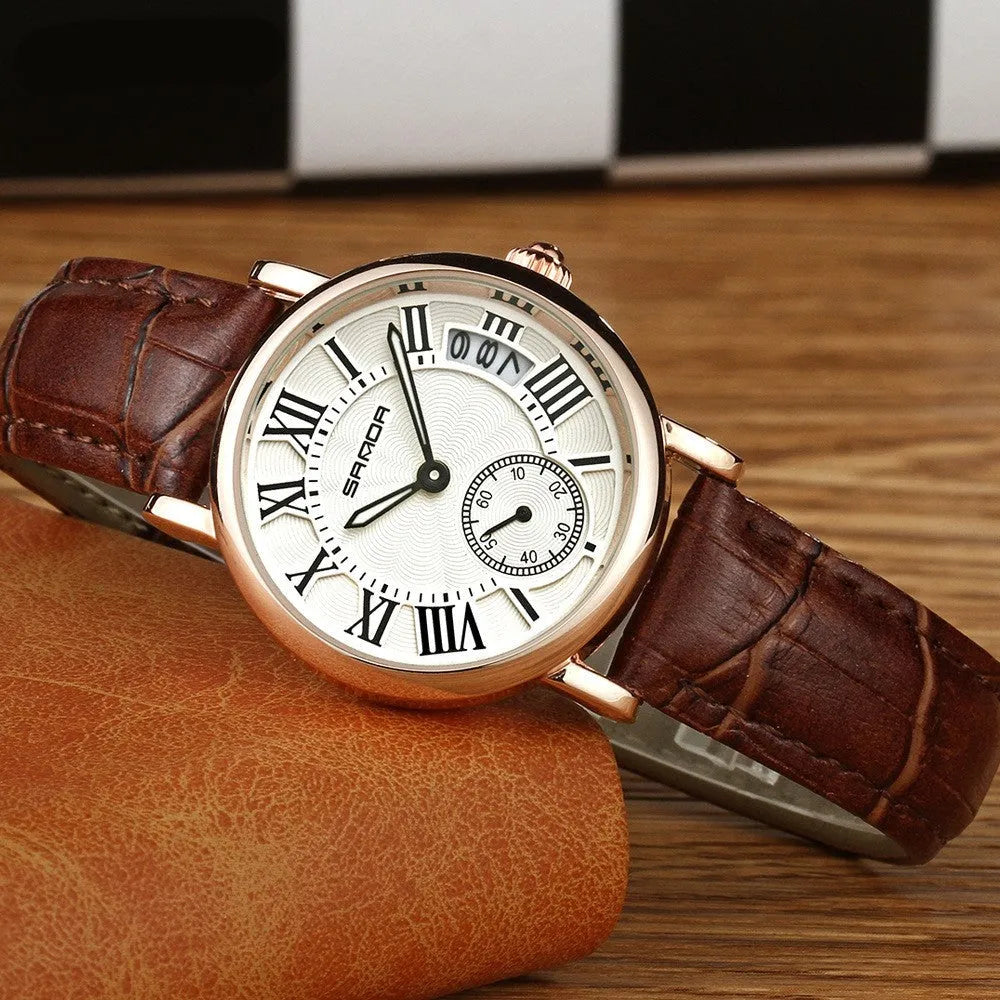 Women's waterproof quartz watch with round 32mm dial, leather strap, and onion crown