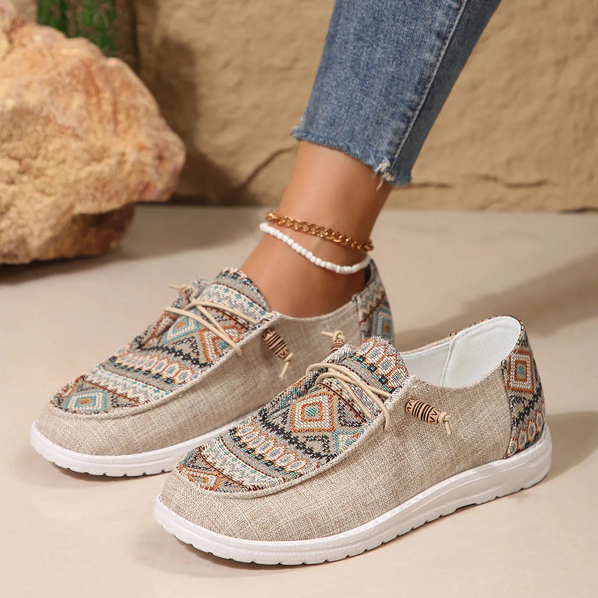 Women's flat round toe casual shoes in black, dark grey, or khaki with a low-top design and rubber sole.