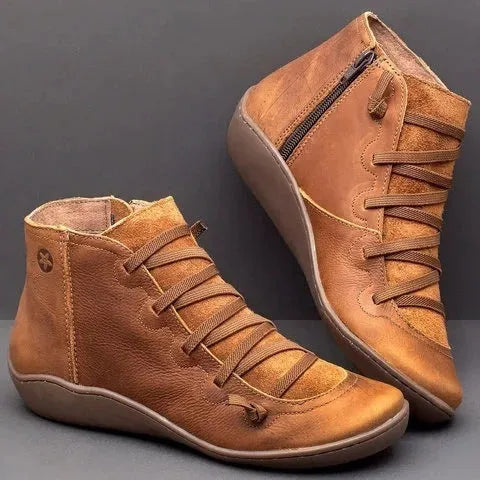 Women's casual ankle booties with a round toe, wedge heel, PU upper, and rubber sole in a selection of colours.