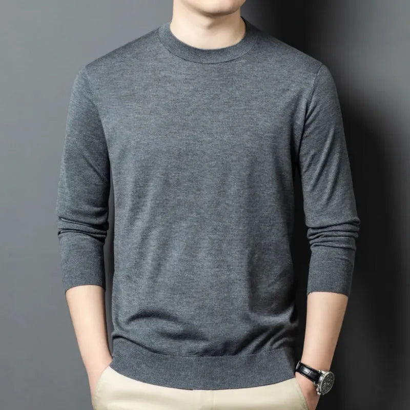 Men's round neck long sleeve wool sweater in a pullover style for winter.