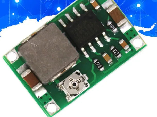 Mini-360 green DC-DC buck converter module measuring 17x11x3.8mm with adjustable voltage output