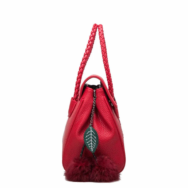 Women's lychee pattern cowhide leather handbag with crossbody strap, 31cm width, 13.5cm thickness, 22cm height, available in black colour option