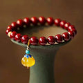 Handmade wave-shaped cinnabar and copper bracelet in national style design