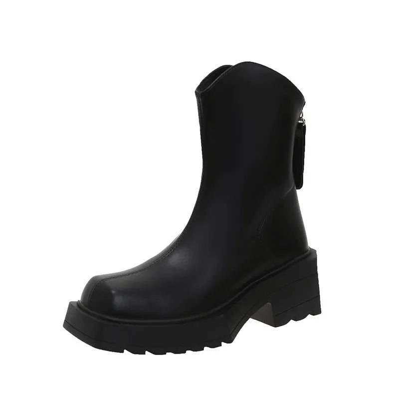 Black women's platform Martin boots with square toe and back zipper, showing mid-calf height.