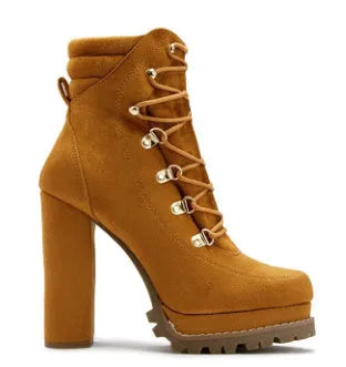 Women's suede ankle boots with a thick high heel in army green, shown from the side.