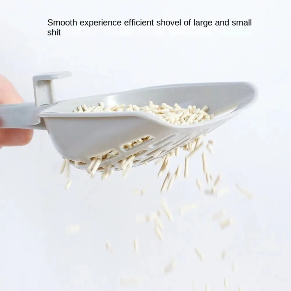 Grey plastic cat litter scoop with attached waste collection base tray