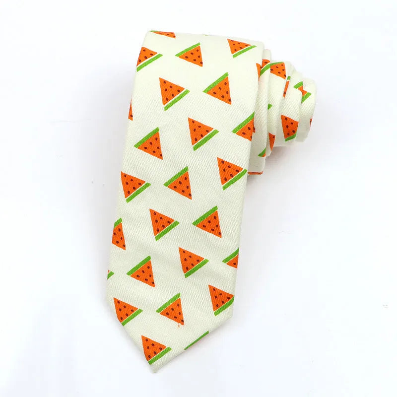 Narrow cotton bow tie with a printed cartoon pattern in a selection of colours.