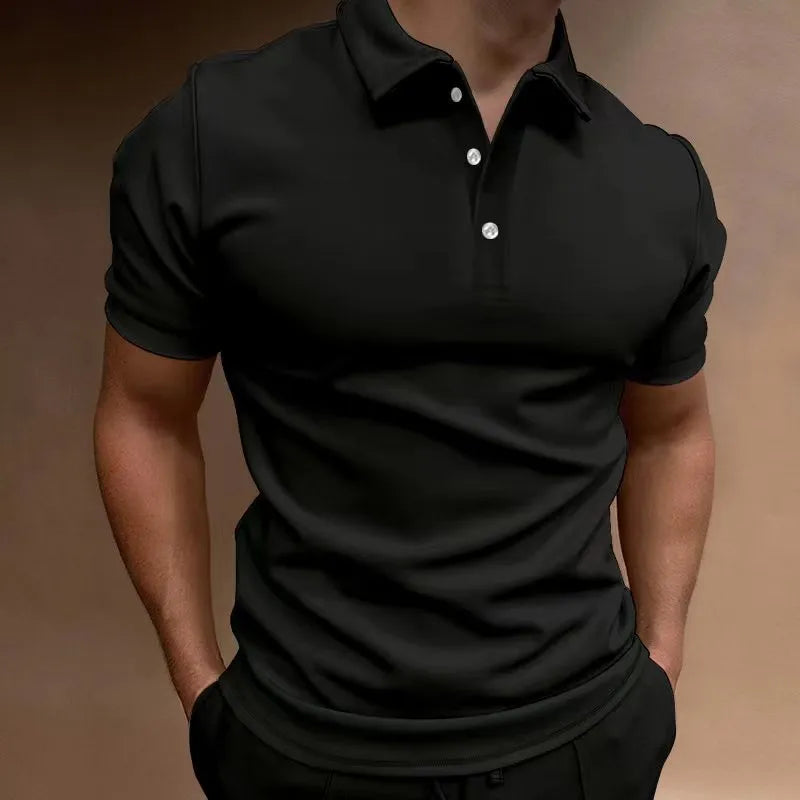 Man wearing a loose fit grey cotton blend T-shirt with a button-down front and short sleeves.