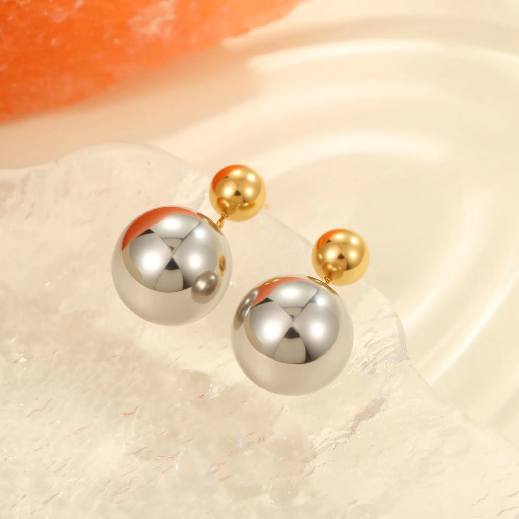Stainless steel ear studs with round beads and colour-block design