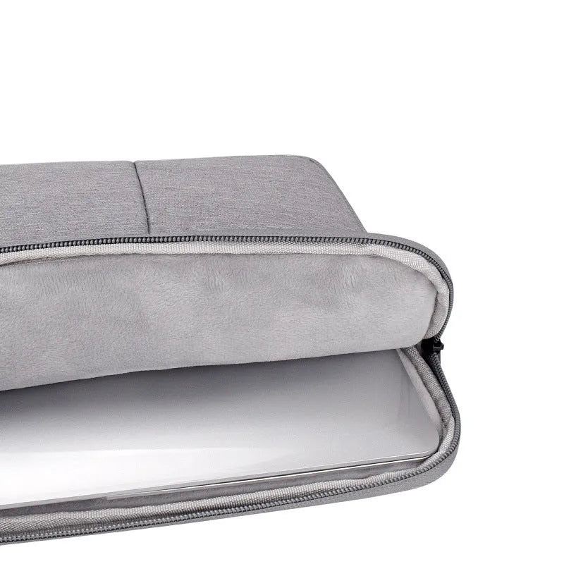 Grey waterproof polyester laptop inner bag with smooth nylon lining, fits 13.3 inch device