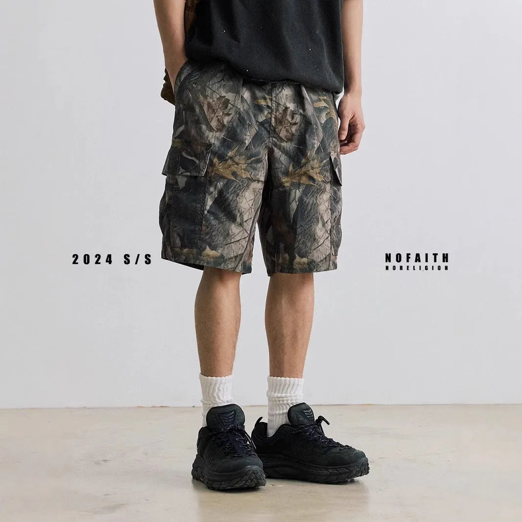 Straight-leg denim shorts in black and army green colours showing loose casual fit and mid waist design