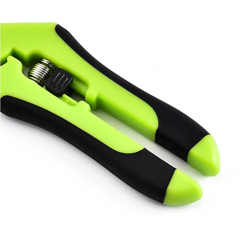 Pair of green stainless steel pruning gardening scissors 16.5 cm long on white background