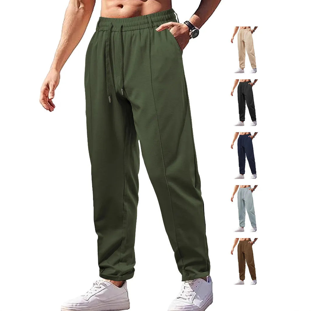 Men's high-waist drawstring casual trousers in cotton-like polyester fabric, available in six colours