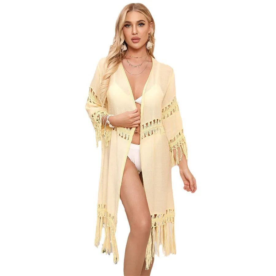 Women's yellow hand-crocheted acrylic beach cover-up cardigan with tassel trim, loose fit.