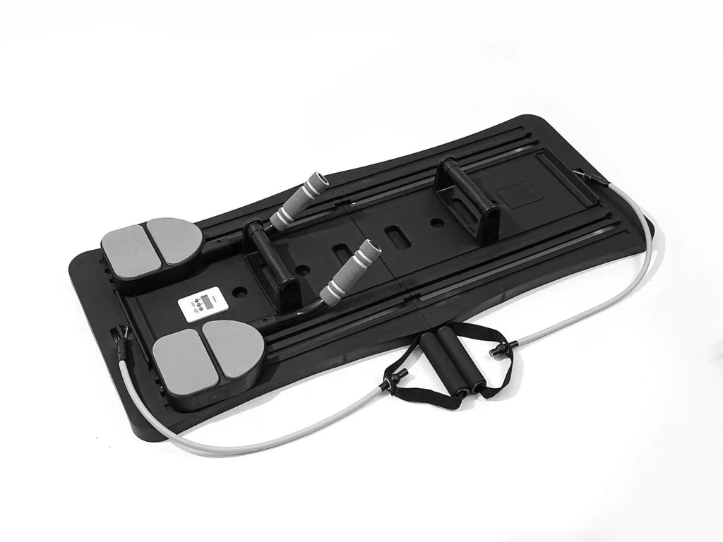 Purple foldable belly panel trainer for abdominal exercises on a home floor