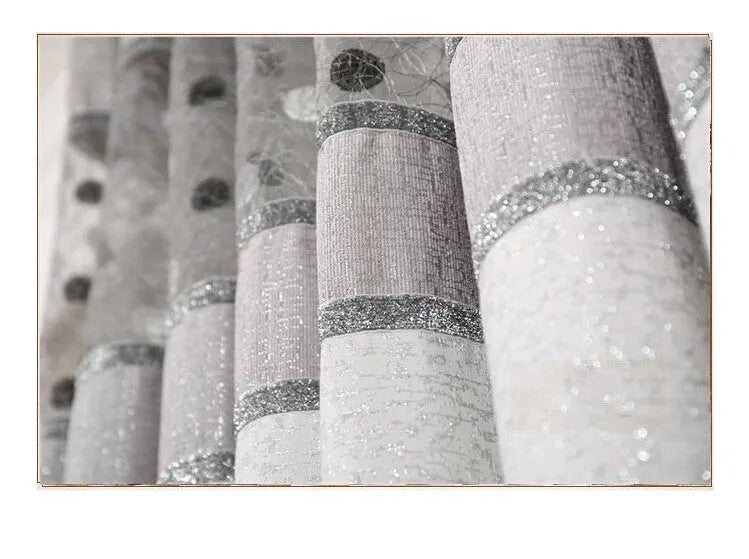 Single blackout curtain panel showing hook heading style with blackout lining visible at edge