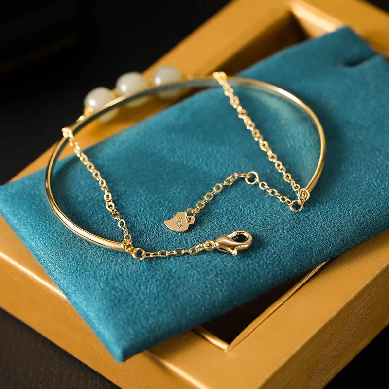 Jade lucky beads bracelet with gold inlay treatment in women's faux two-piece style