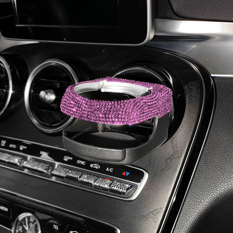White rhinestone-decorated car cup holder bracket mounted on a car air vent