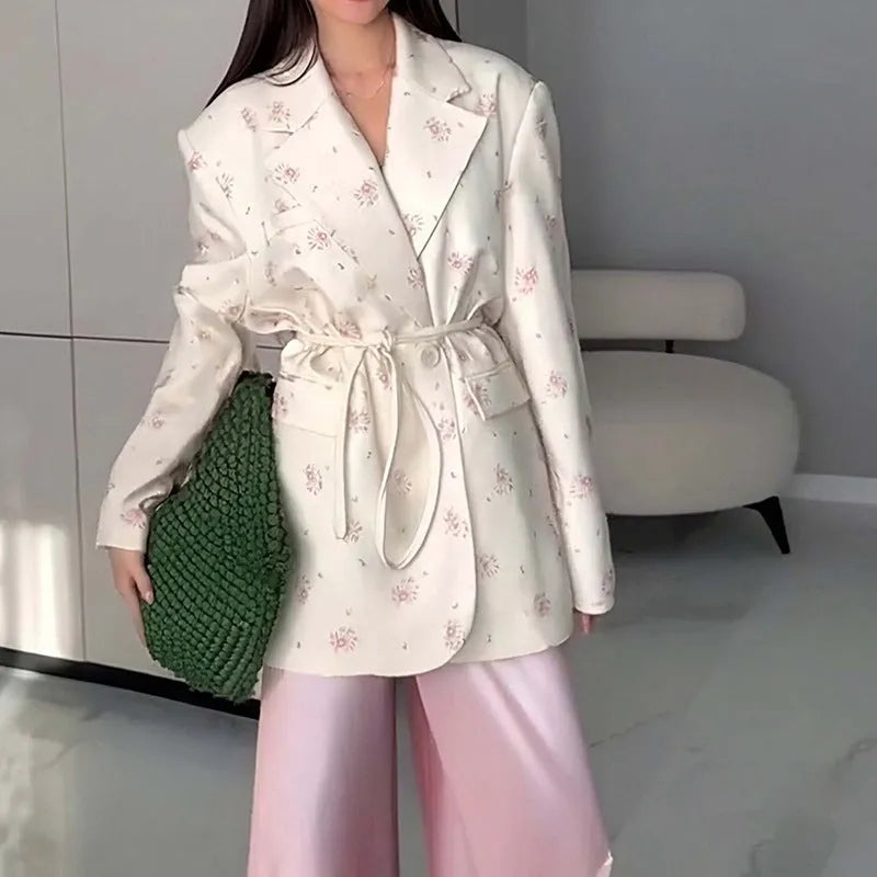 Womens lace-up collar suit jacket in a floral print with a cinched waist