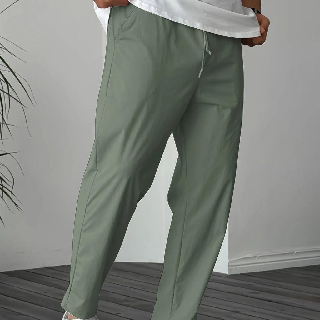 Men's khaki straight-leg casual trousers with a drawstring waist and ribbon pocket.