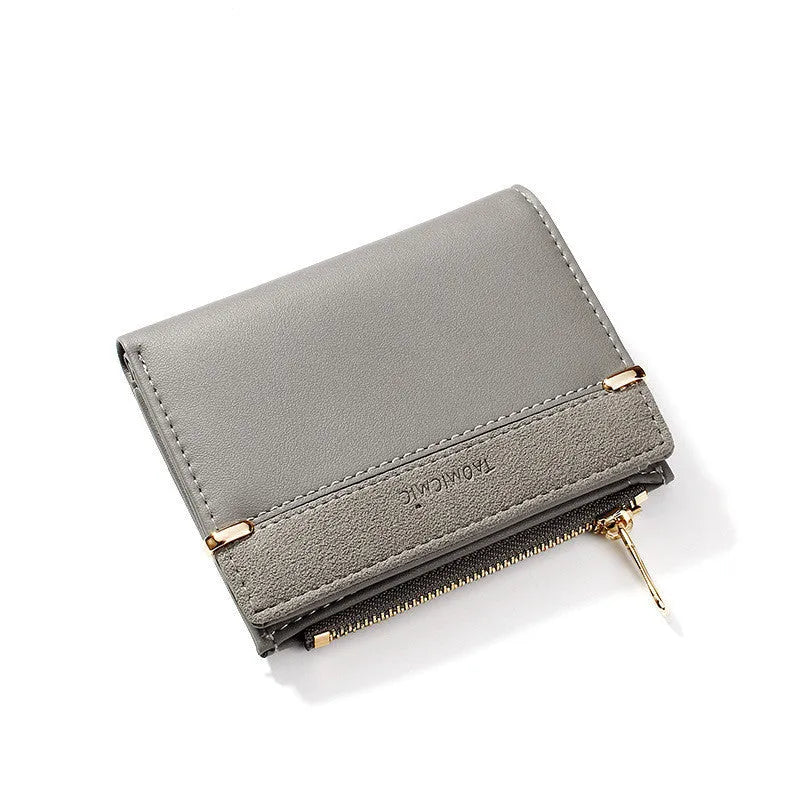 Short ladies wallet with zipper closure showing multi card slots and compartments in PU leather