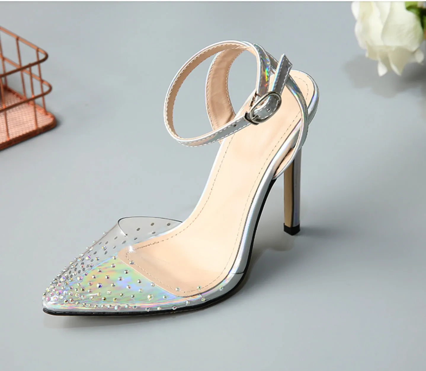 Women's pointed toe diamond sandals with stiletto heels on a white background