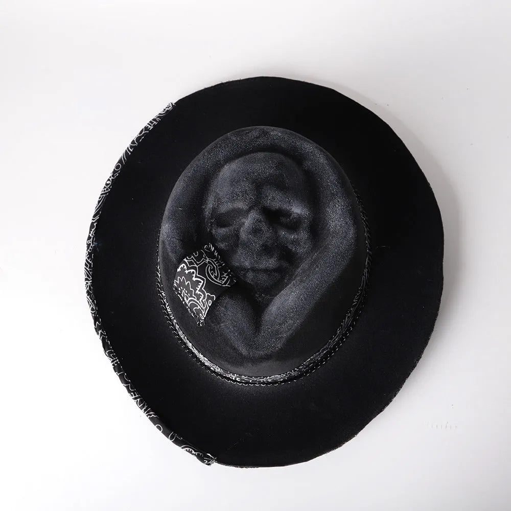 Handmade wool felt conical hat with skull design showing conical silhouette and wool texture