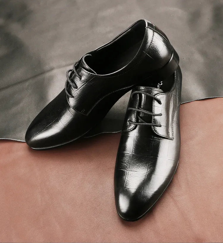 Men's black leather derby shoes with pointed toe and checkered stitching detail