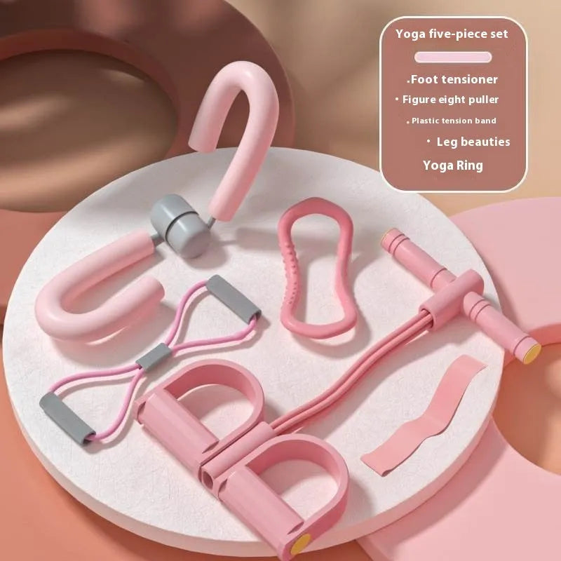 Yoga four piece fitness set showing leg beauty device, yoga ring, pedal tension device and figure eight tension rope