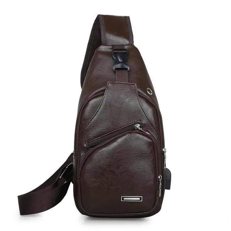 USB charging chest bag in black PU leather with embossed pattern showing front zipper and USB port